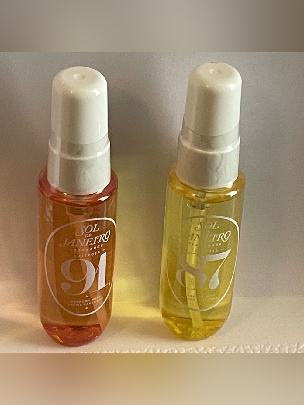 Sol de Janeiro 91 & 87 Fragrance Oils in Orange and Yellow
